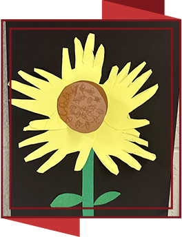 Student's sunflower artwork on the wall